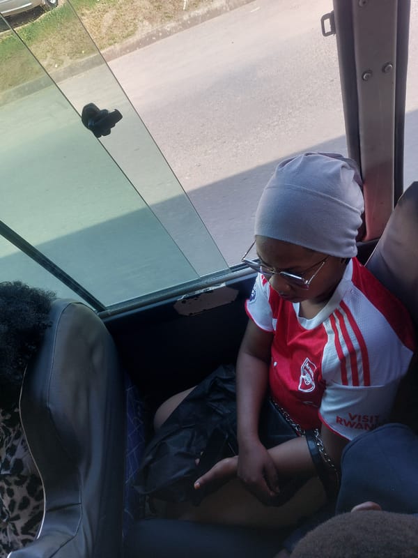 Person in Arsenal jersey spotted with metal collar in Dar es-Salaam