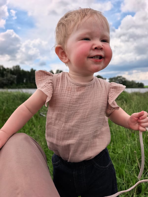 Family river day with fishing and paddleboarding in Russian countryside