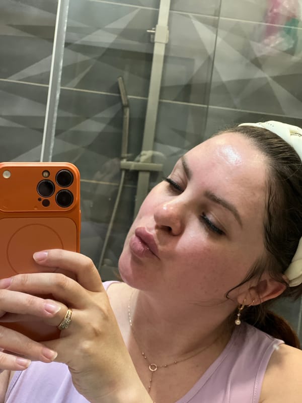 Woman documents silver medal win in Russian bathroom selfies