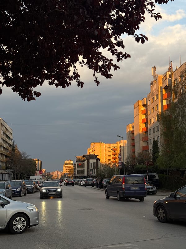 Golden hour illuminates Sofia streets in late afternoon scene