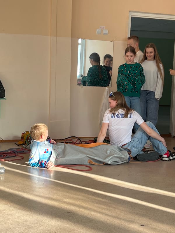 Youth climbing session documented at Berezniki gymnasium facility