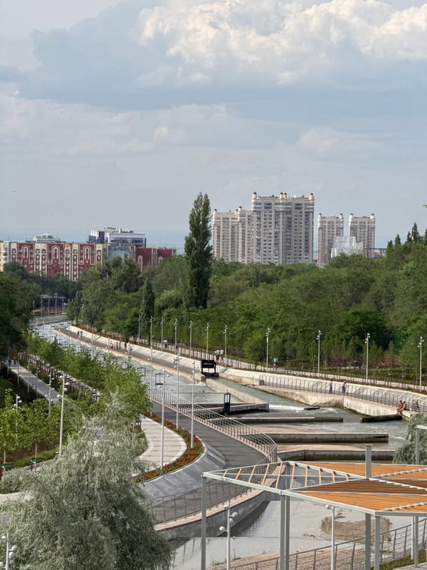Almaty's renovated Small Almaty River canal and park on a cloudy day