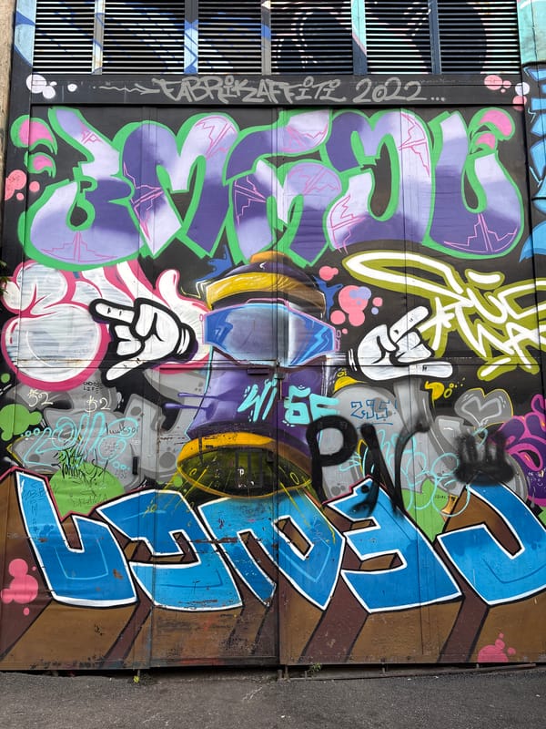 Street art tour through a graffiti-saturated urban neighborhood