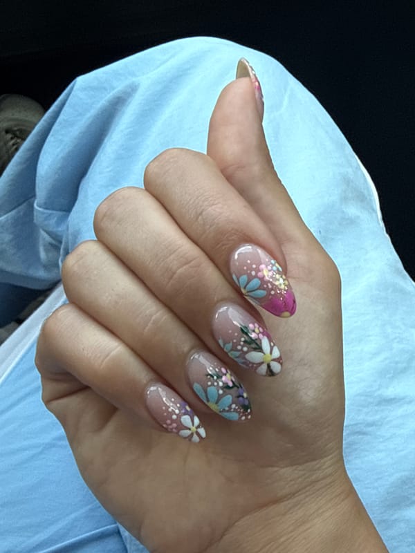 Elaborate nail art displayed in Macon