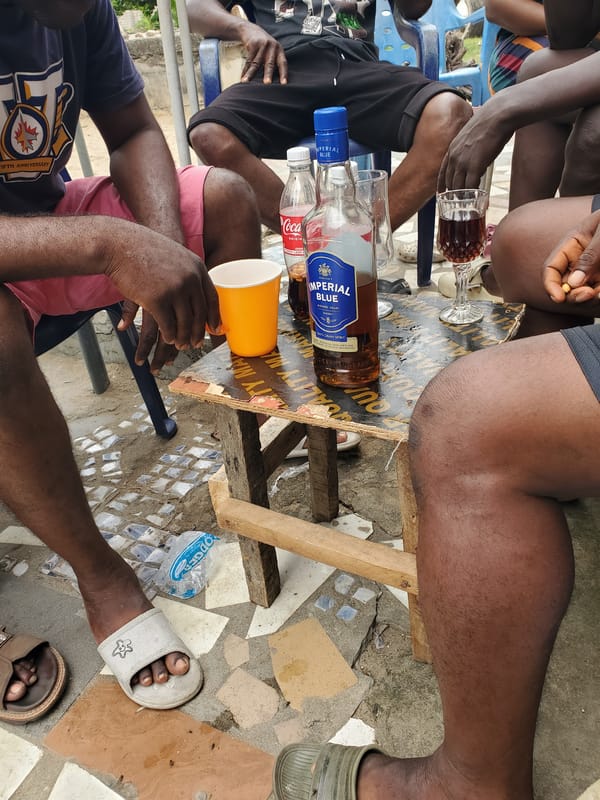 Social gathering with drinks observed in Isunba, Nigeria
