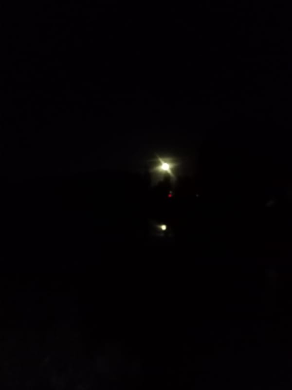 Night streets, streetlamps, and a spider web close-up