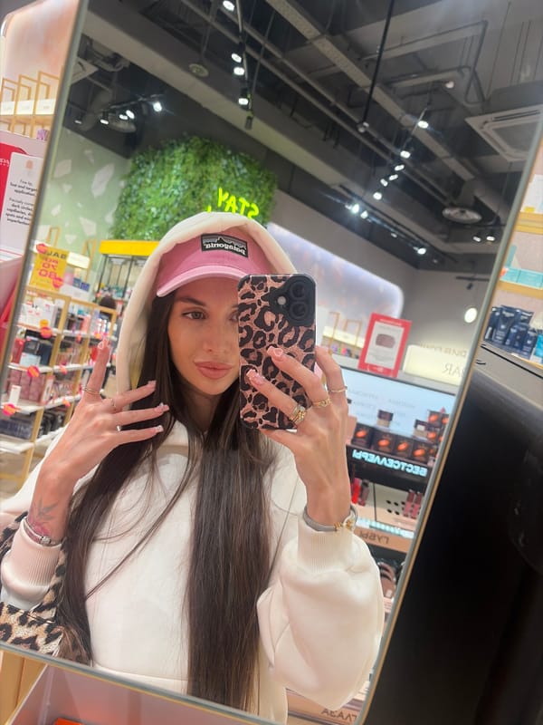 Woman documents shopping trip with selfies at Izhevsk mall