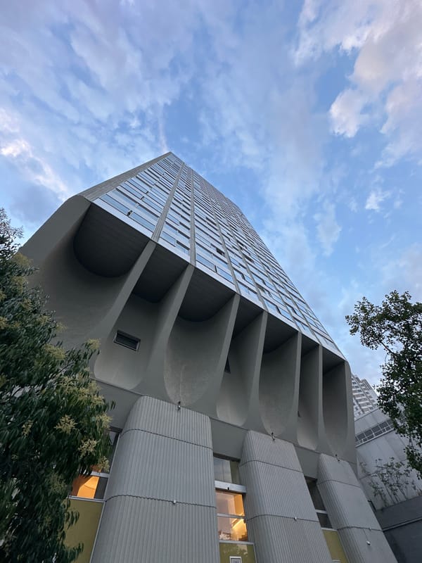 Street-level architectural tour through mixed Paris neighborhoods at dusk