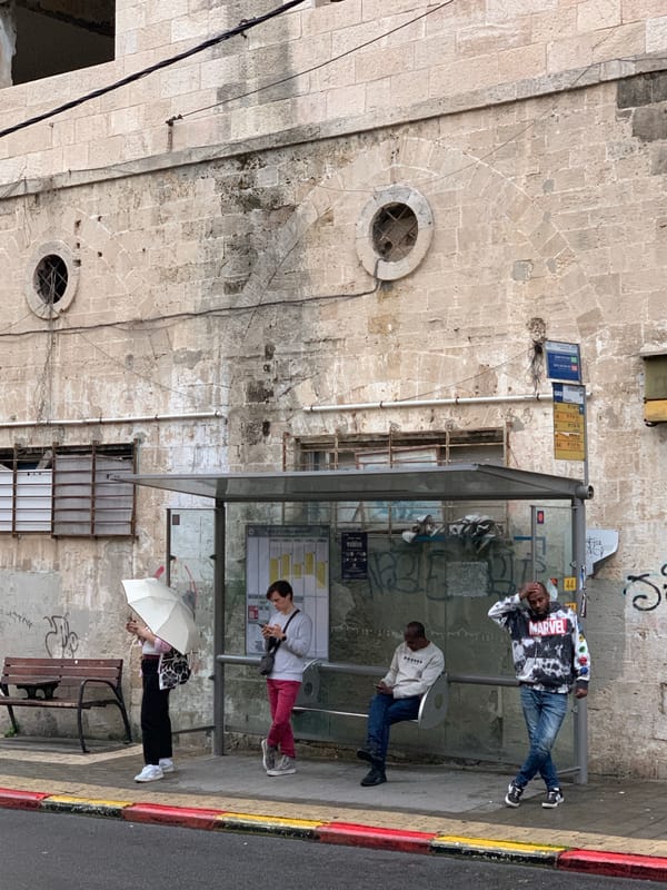Tel Aviv street vendors and restaurants captured in midday scenes
