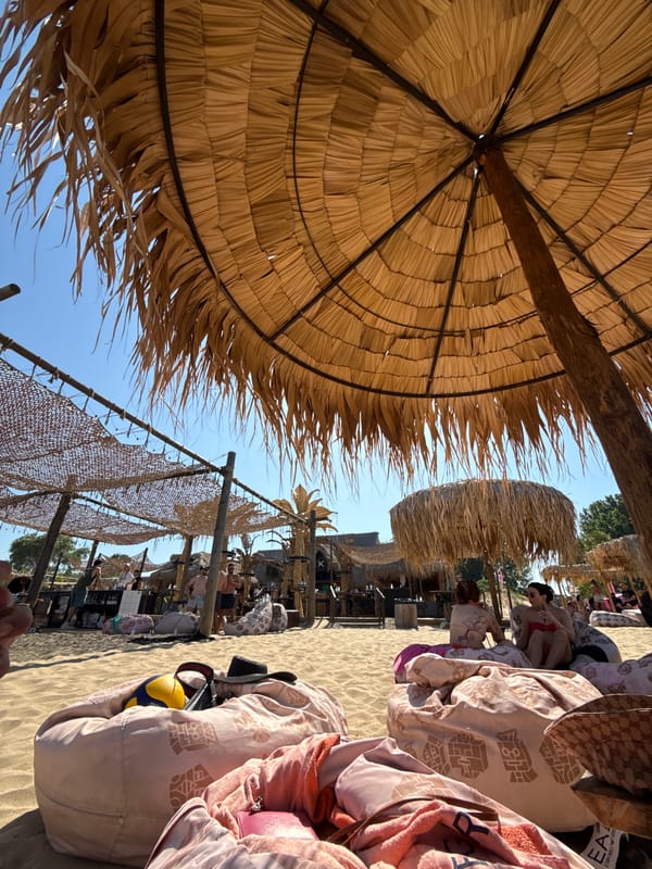 Beanbags and straw umbrellas on a Sozopol beach
