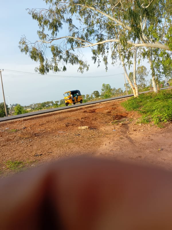 Rural Nigerian morning: rickshaws, footprints, everyday objects documented