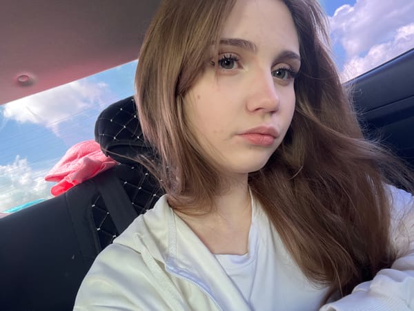 Woman Takes Selfies in Vehicle in Marievka, Russia