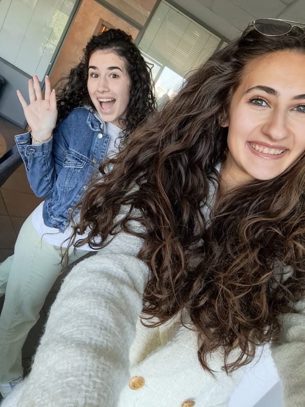 Women photograph selfie, travel by car in early morning