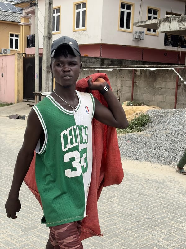 Man in Celtics jersey spotted under cloudy skies in Nigeria
