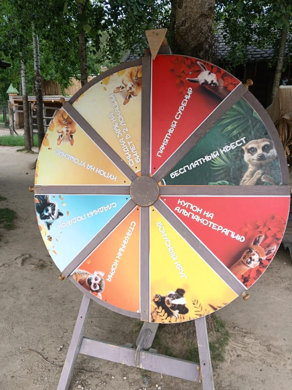 Visitor documents zoo attractions and sculptures in Baranavichy, Belarus
