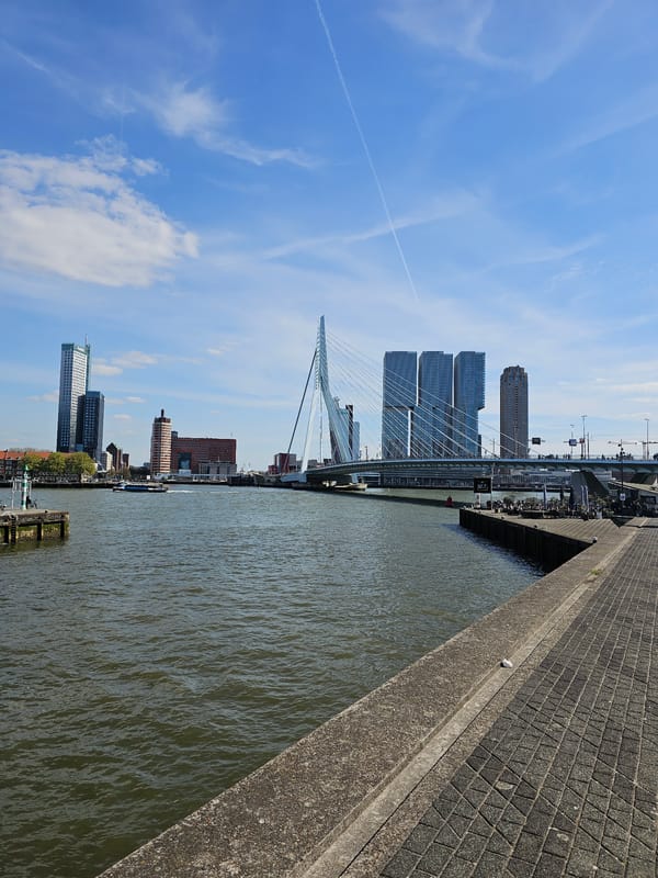 Rotterdam waterfront and historic warship documented from elevated viewpoints