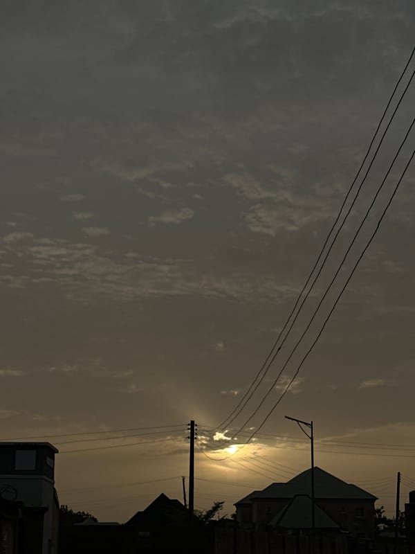 Overcast skies with power lines documented in Kirana, Nigeria