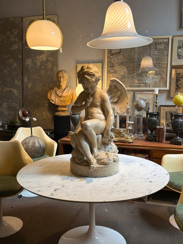 Buenos Aires antique store scene captured with angel sculpture