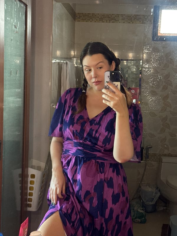 Mirror selfie in patterned dress, San Phra Net bathroom