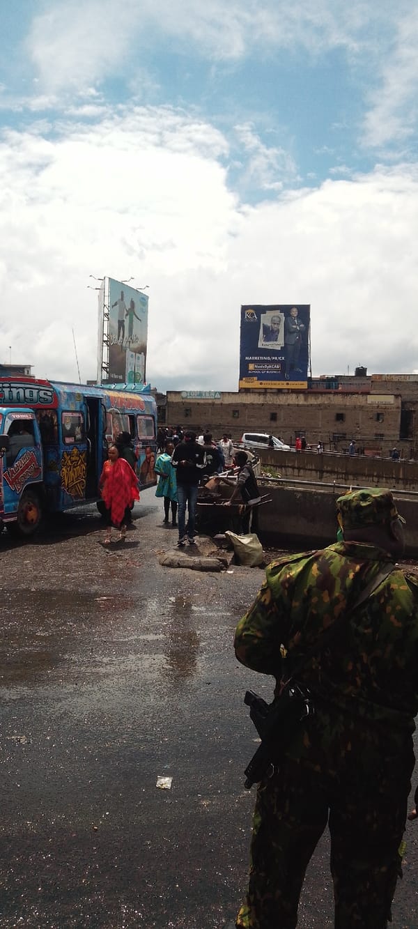 Matatu parked on wet Nairobi street after rainfall