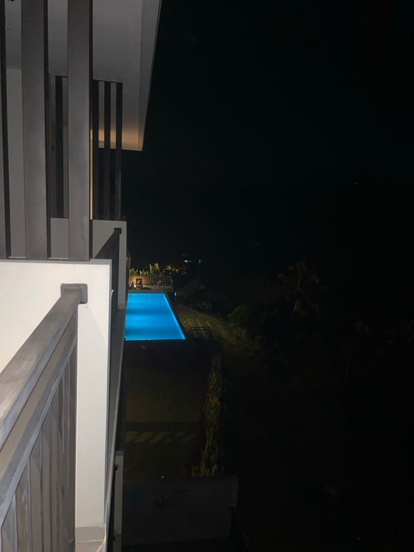 Nighttime pool scene observed in Rendang, Indonesia