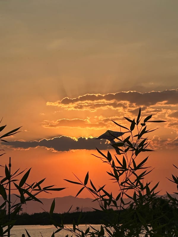 Calm Mediterranean sunset with a kite over Fethiye