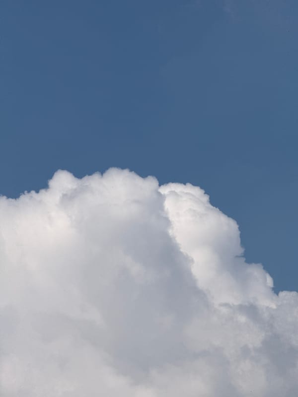 Milan resident documents afternoon clouds and local apartment architecture
