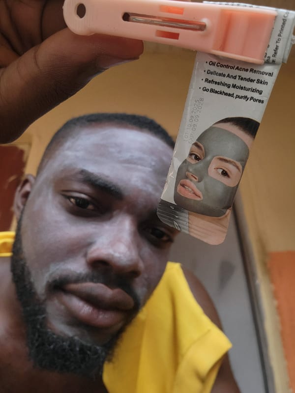 Man applies face mask in Jos, Nigeria
