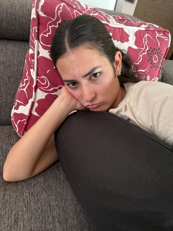 Woman rests on couch in Mexican town