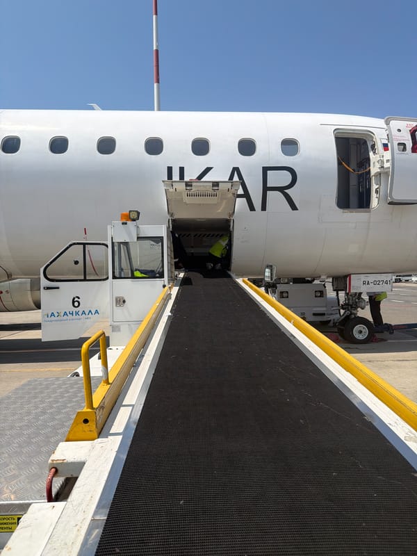 Airport activity on the Dagestan tarmac, summer morning