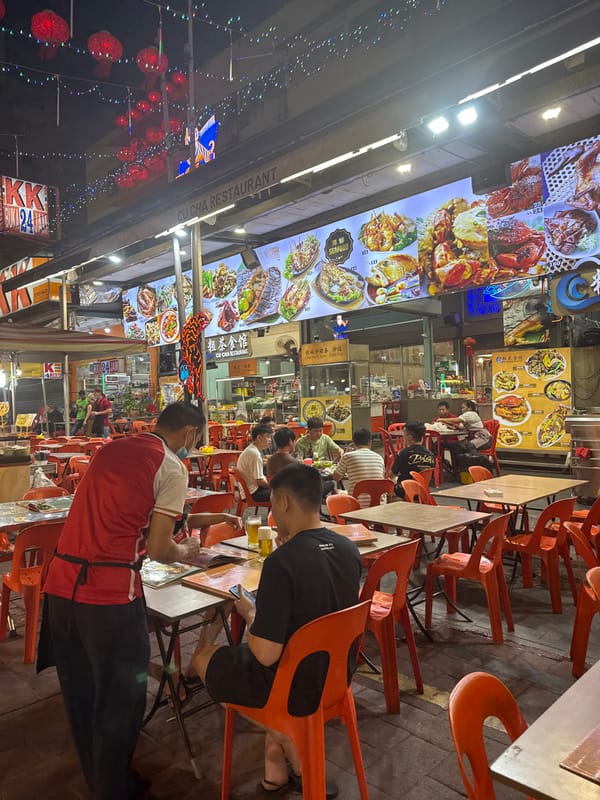 Evening dining scene documented at Kuala Lumpur night market