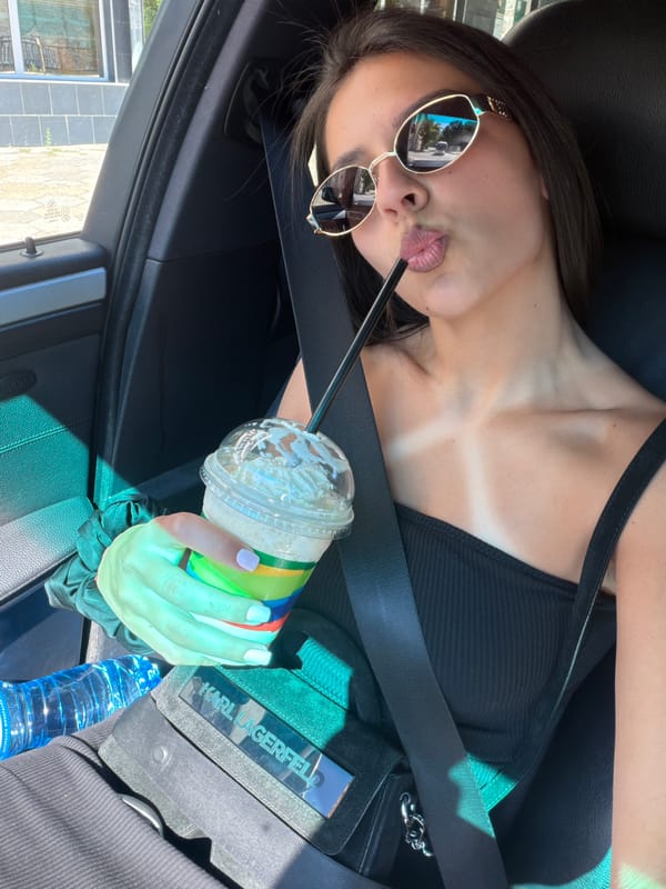 Passenger seat drink moment somewhere in Gabrovo, Bulgaria