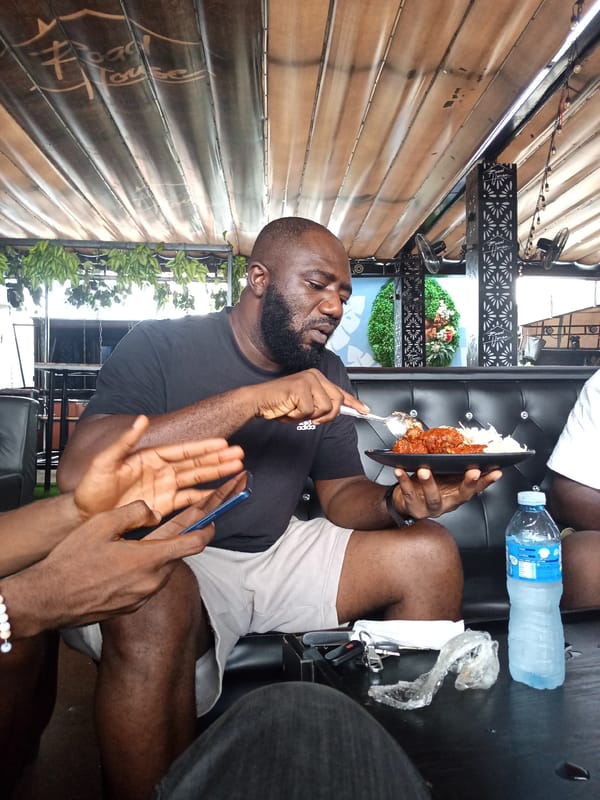 Two men share casual meal at Howayi restaurant