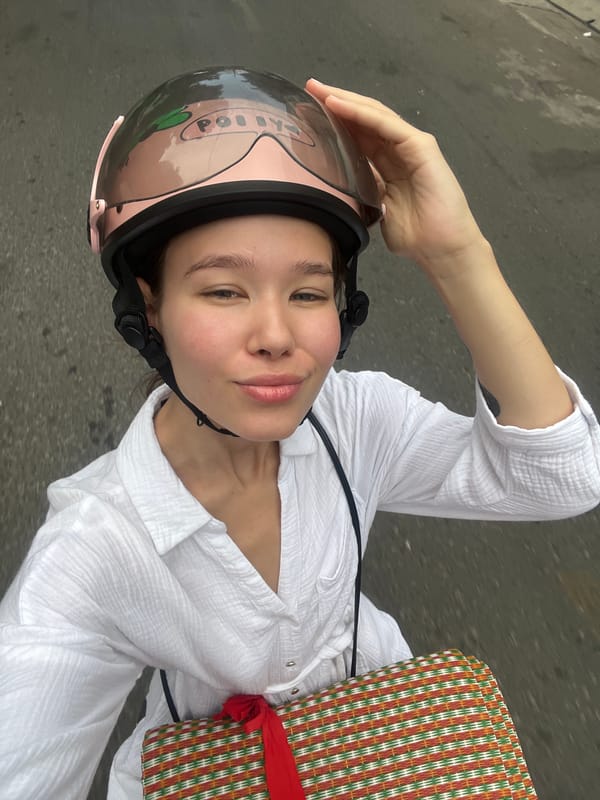 Woman on scooter observed in Nha Trang street