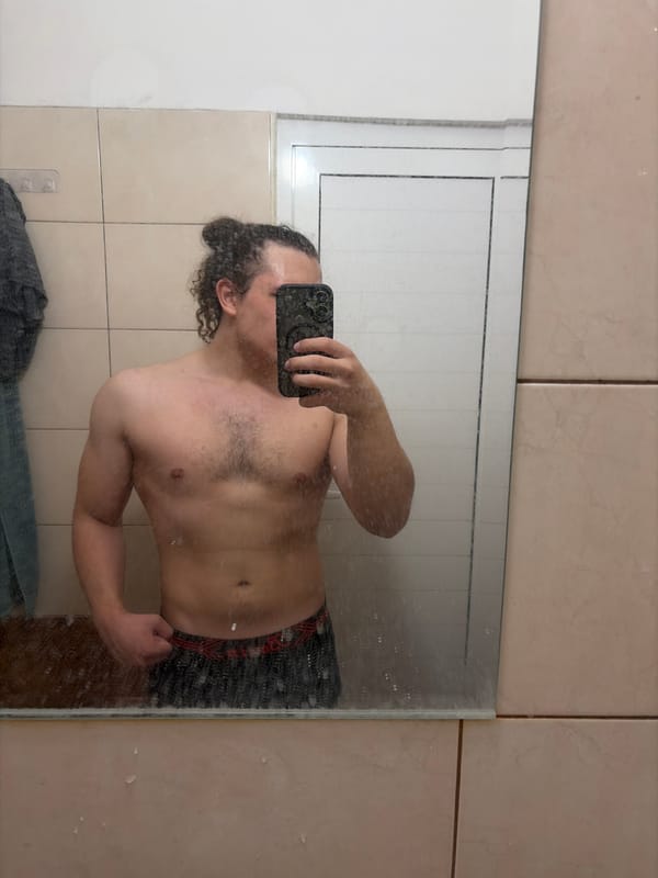 Person takes bathroom mirror selfies in Plovdiv, Bulgaria