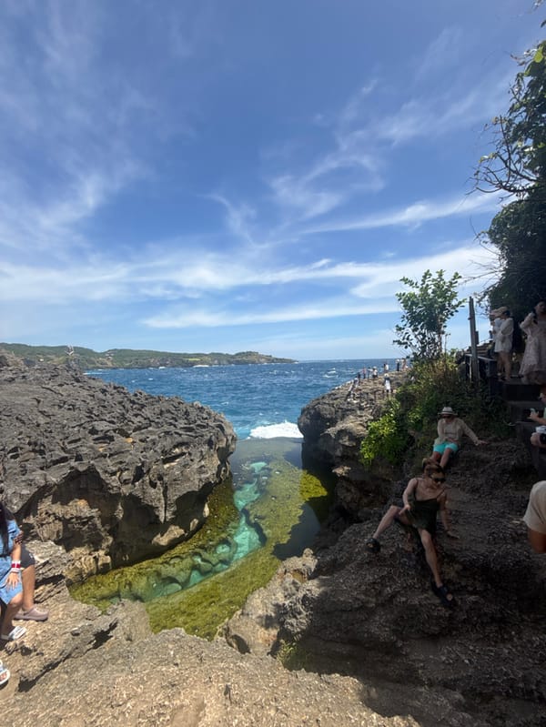Tourists capture Angel's Billabong natural pools at Nusa Penida