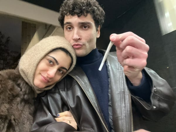 Couple documents elevator selfies and food purchases in Madrid