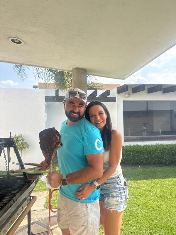 Couple grills meat outdoors in Cháhuac, Mexico