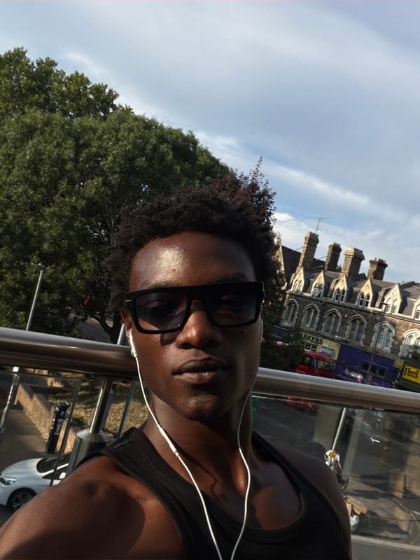 Summer selfie in South London, sunglasses and earbuds on