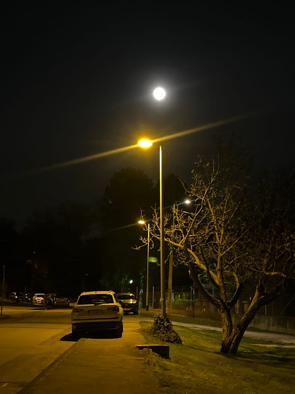 Moonlit street scene captured in Zagreb evening