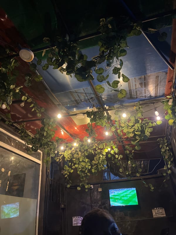 Evening dining and soccer viewing captured in Rumuepirikom establishment