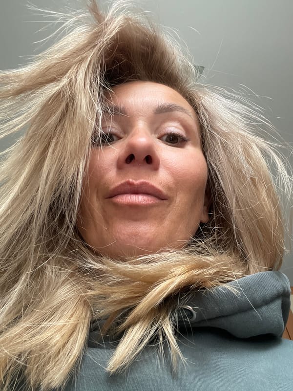 Series of selfies in a hooded sweatshirt, various angles