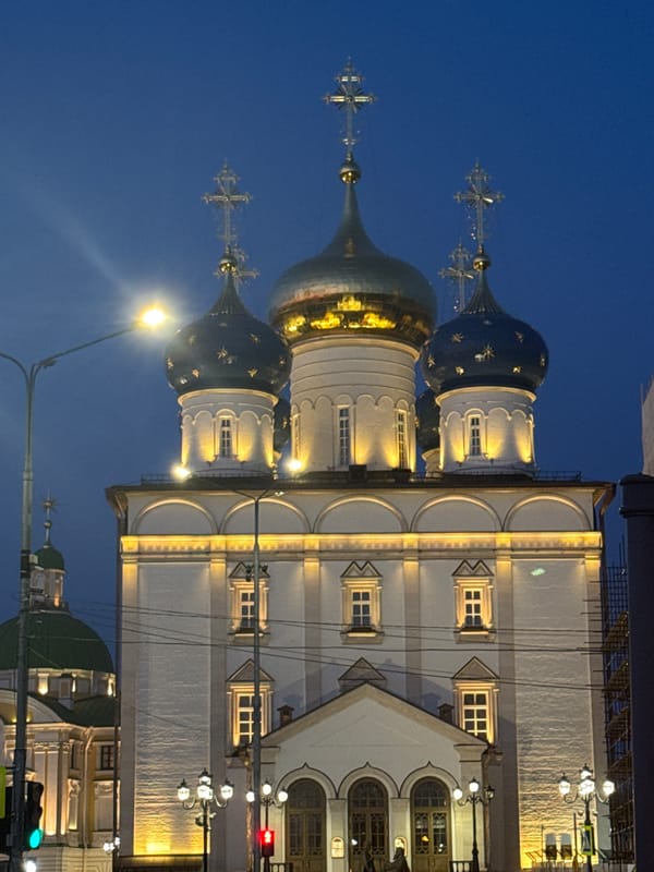 Orthodox church domes illuminated at night in Tver, Russia