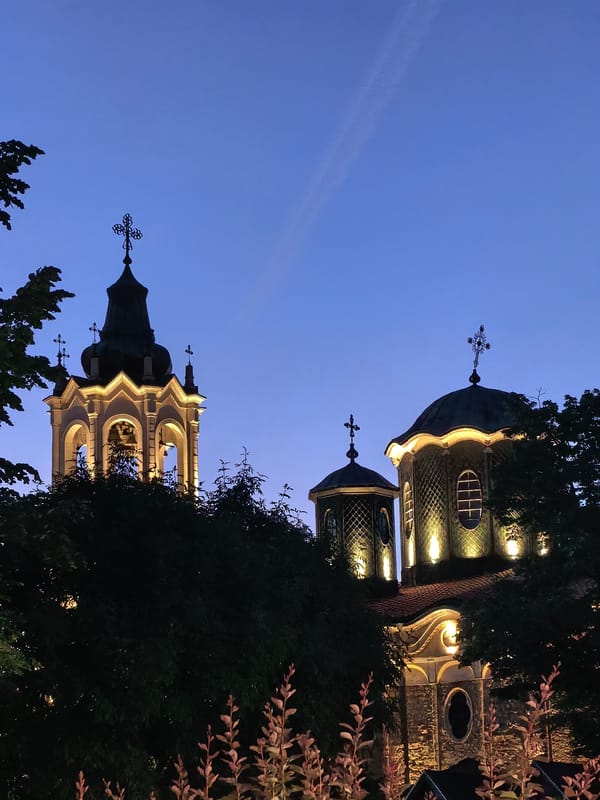 Twilight scenes documented in Svishtov, Bulgaria featuring church and streetlights