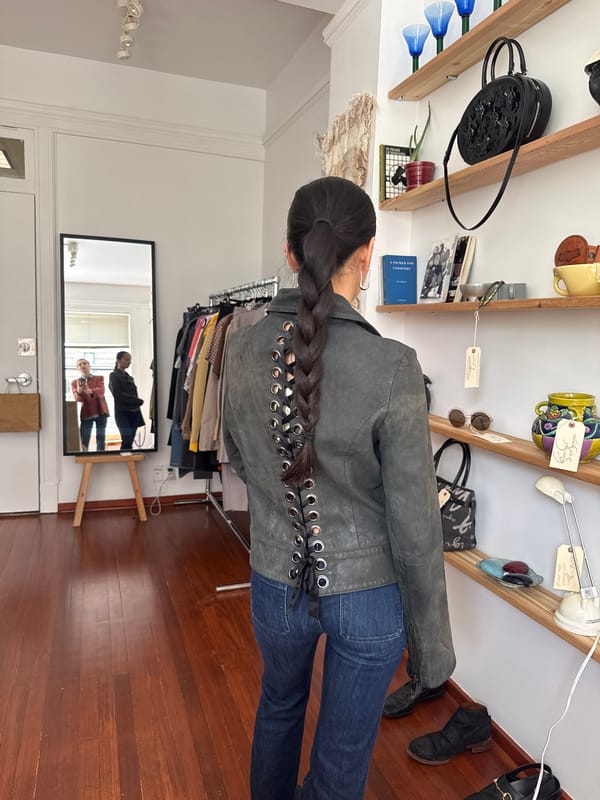 Person documents outfit changes in Vancouver mirror selfie session