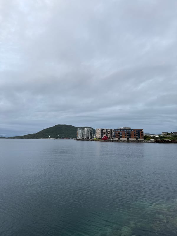 Harstad waterfront and graffiti-covered industrial space, July evening