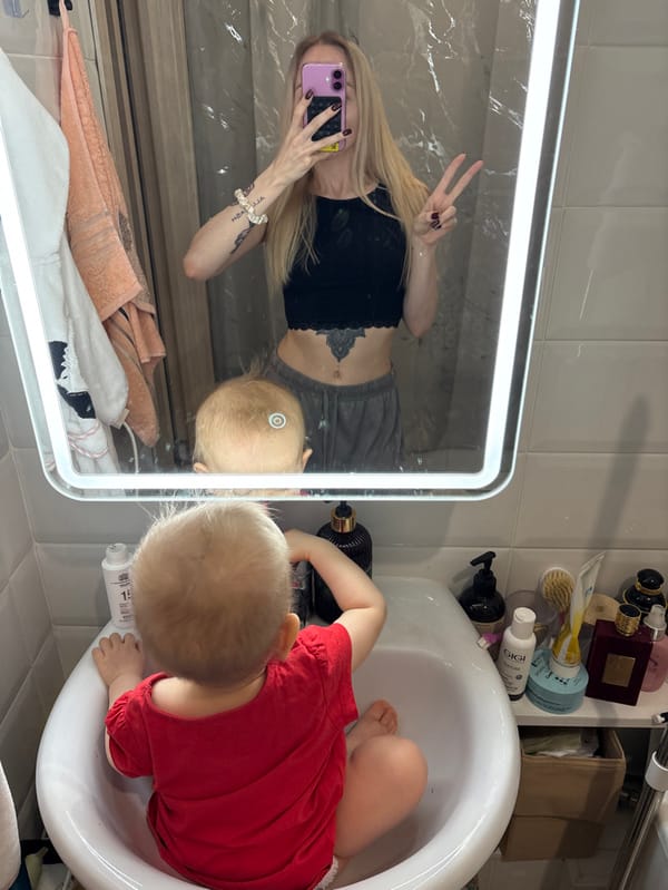 Mother, baby share quiet domestic moments in Khimki home