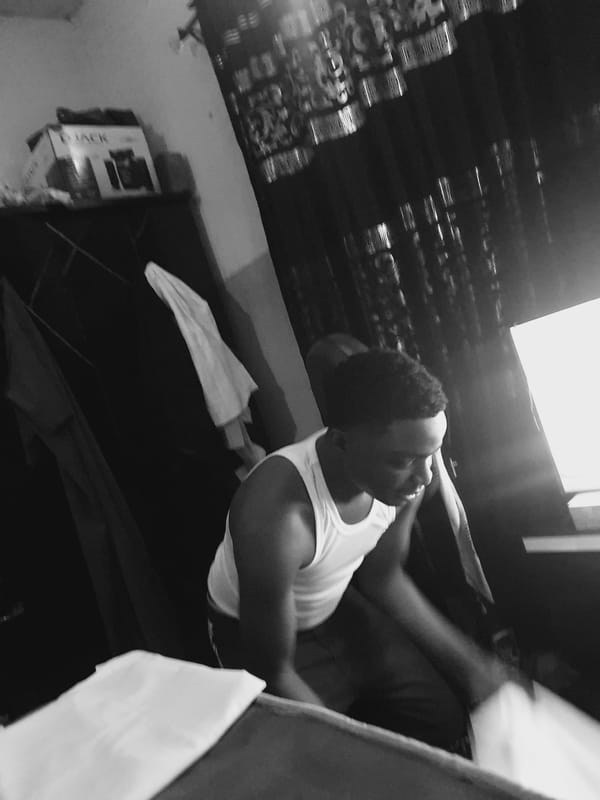 Man documented in various poses inside Lokoja room