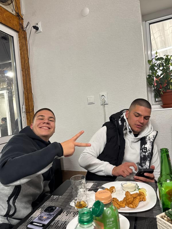 Young men dine at restaurant in Momina Klisura, Bulgaria