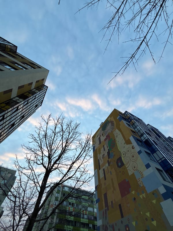 Klimt-style mural photographed on Kudrovo building facade
